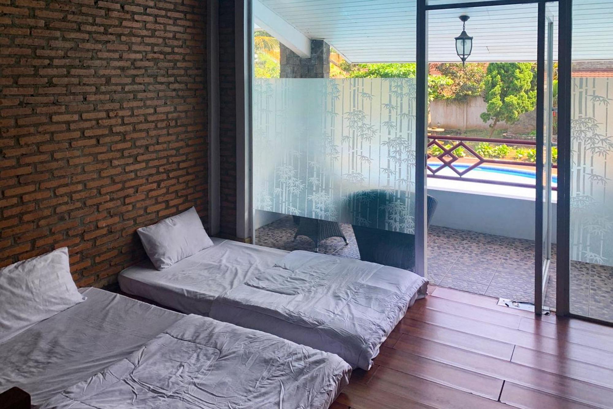 Urbanview Hotel Villa Q Gisting Bandjarnegeri المظهر الخارجي الصورة